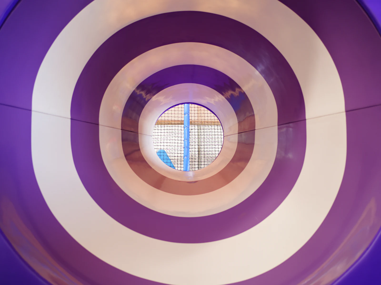 View through a purple and cream padded tunnel inside Main Play.